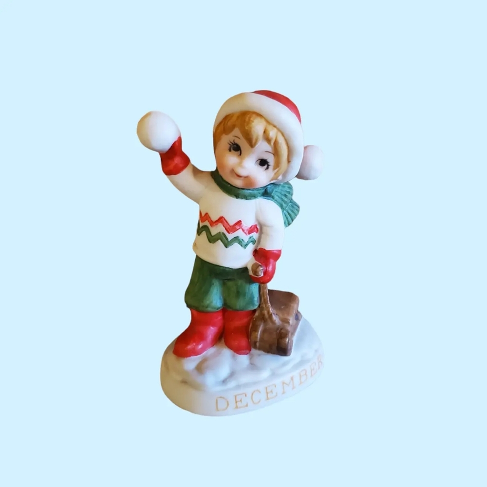 Vintage December boy figurine